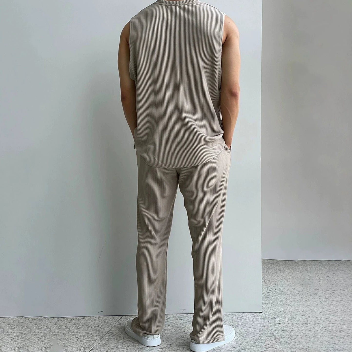 PLEATED SLEEVELESS SHIRT & WIDE DRAWSTRING PANTS
