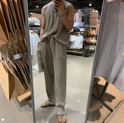 PLEATED SLEEVELESS SHIRT & WIDE DRAWSTRING PANTS