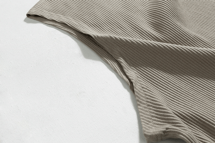 PLEATED SLEEVELESS SHIRT & WIDE DRAWSTRING PANTS