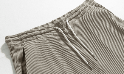 PLEATED SLEEVELESS SHIRT & WIDE DRAWSTRING PANTS