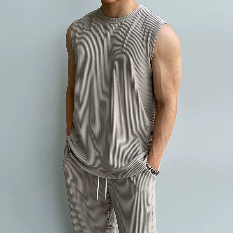 PLEATED SLEEVELESS SHIRT & WIDE DRAWSTRING PANTS