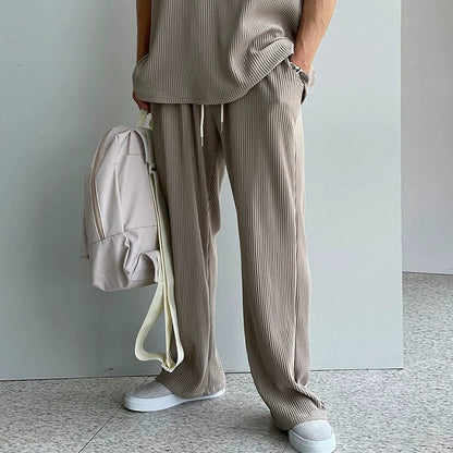 PLEATED SLEEVELESS SHIRT & WIDE DRAWSTRING PANTS