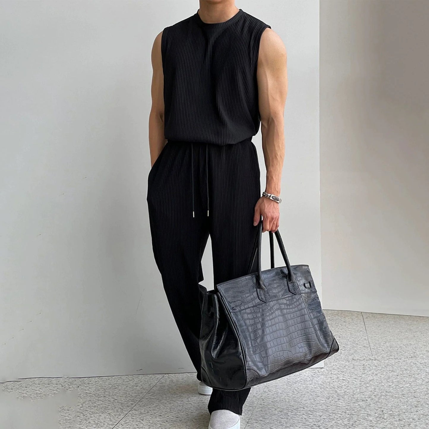 PLEATED SLEEVELESS SHIRT & WIDE DRAWSTRING PANTS