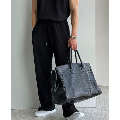 PLEATED SLEEVELESS SHIRT & WIDE DRAWSTRING PANTS