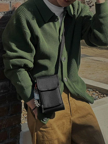 GREEN KNIT BUTTON-UP SWEATER