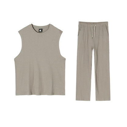 PLEATED SLEEVELESS SHIRT & WIDE DRAWSTRING PANTS