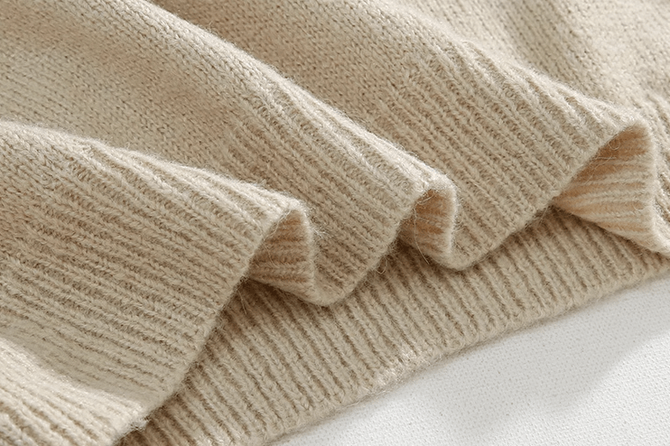 KNITTED PULLOVER SWEATER