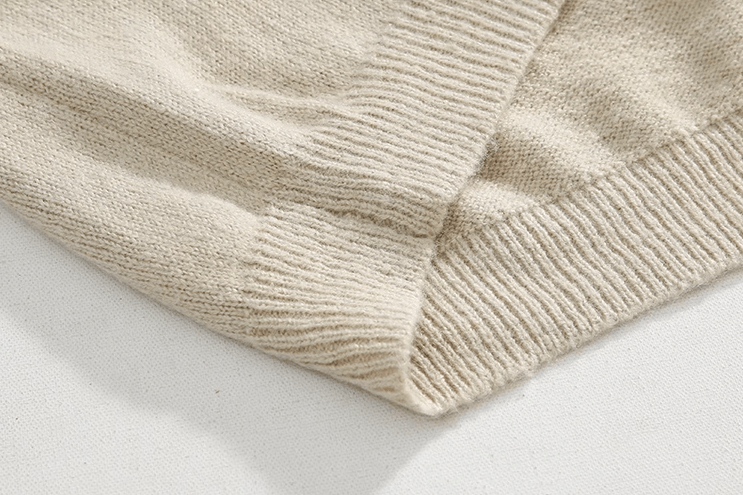 KNITTED PULLOVER SWEATER