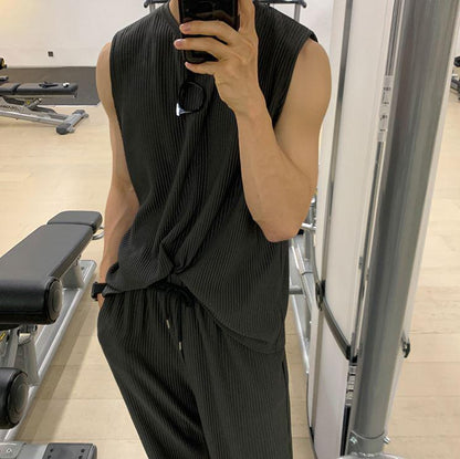PLEATED SLEEVELESS SHIRT & WIDE DRAWSTRING PANTS
